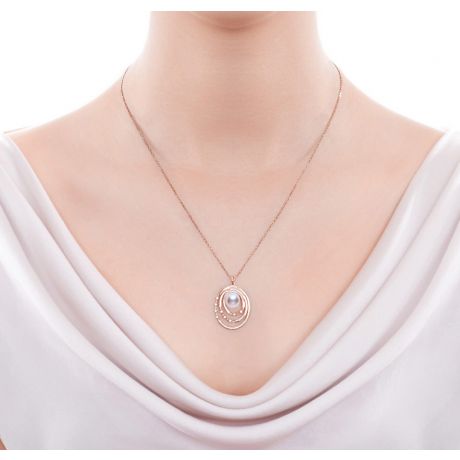 Pendentif perle Akoya Or rose et diamants. Triple cercle