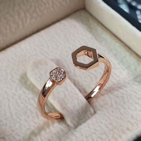 Bague ouverte hexagone. Or rose 18cts, diamants 0.030ct