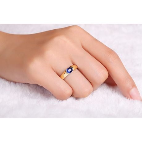 Bague de fiançailles saphir bleu intense et or jaune 18cts