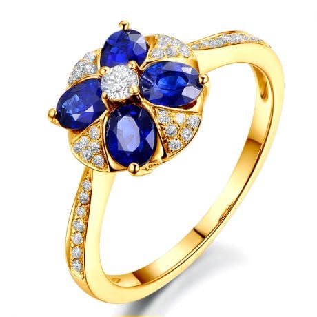 Bague solitaire fleur bleue. Or jaune, saphirs et diamants