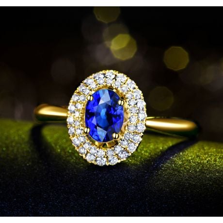 Bague de fiançailles ovale. Or jaune, saphir 0.50ct et diamants