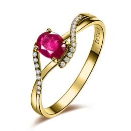 Bague rubis diamants en or jaune - Entre les doigts