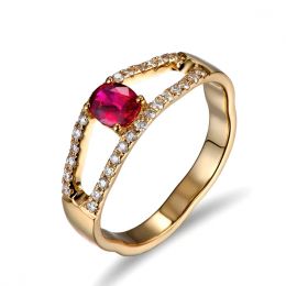 Bague rubis or jaune et diamants sertis