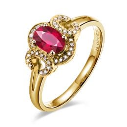 Bague de fiançailles en rubis diamants et or jaune. Motifs bouclés