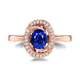 Bague saphir bleu. Or rose, diamants myriade