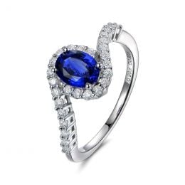 Bague saphir or blanc pavage diamant sinueux