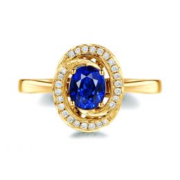 Bague saphir bleu. Or jaune, diamants myriade