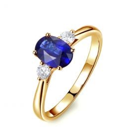 Solitaire trilogie saphir bleu 1 carat avec 2 diamants. Or jaune
