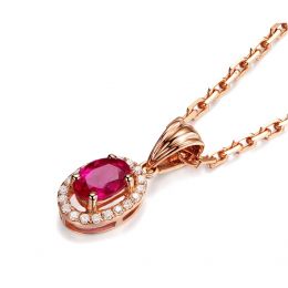 Pendentif Madame Or rose 18 carats. Rubis ovale diamants pendeloque