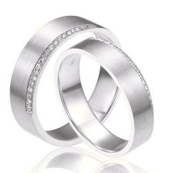 Alliances Couple. Or blanc. Diamants 0.120ct