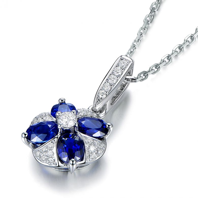 Pendentif solitaire fleur bleue. Or blanc, saphirs et diamants - 11