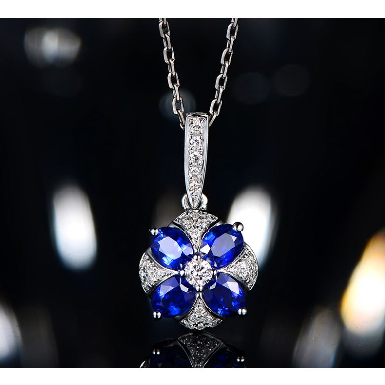 Pendentif solitaire fleur bleue. Or blanc, saphirs et diamants - 7