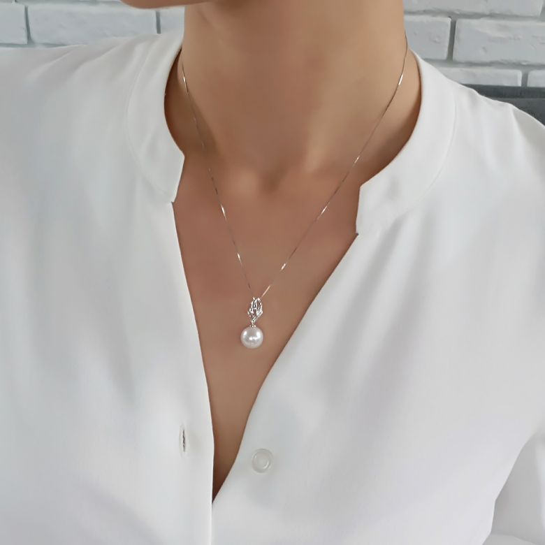 Pendentif jeune pousse printanière - Or blanc et perle - 7 diamants - 5