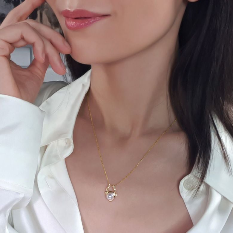 Pendentif Zodiaque. Perle Akoya, Or jaune 18cts - 2
