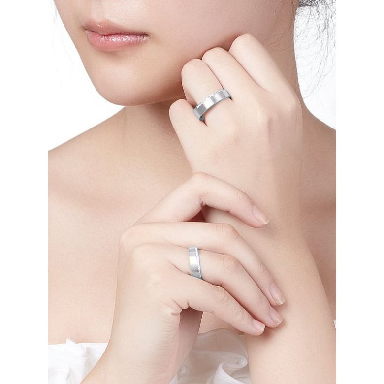 Alliances Couple. Platine. Diamants 0.120ct - 2