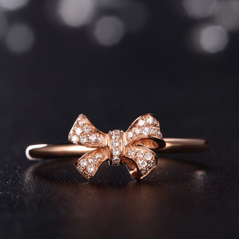 Bague petit noeud Or rose 18cts. Diamants 0.080ct - 3