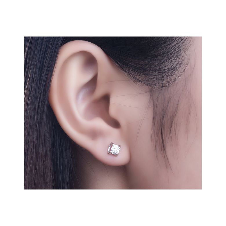 Puces diamants griffes taille brillant 0.20 carat. Personnalisables platine - 2