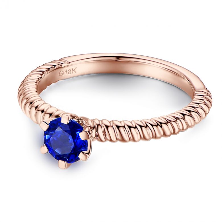 Bague or rose monture torsadée. Saphir bleu 0.55ct - 6