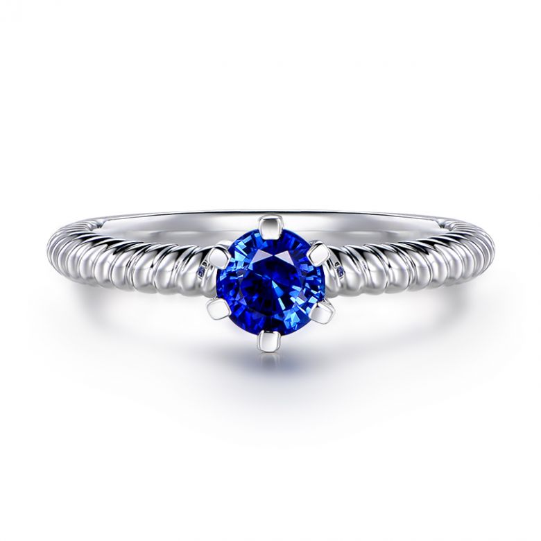 Bague or blanc monture torsadée. Saphir bleu 0.55ct - 1