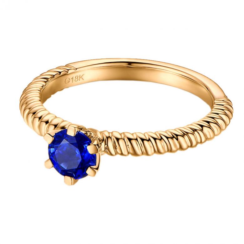 Bague or jaune monture torsadée. Saphir bleu 0.55ct - 6