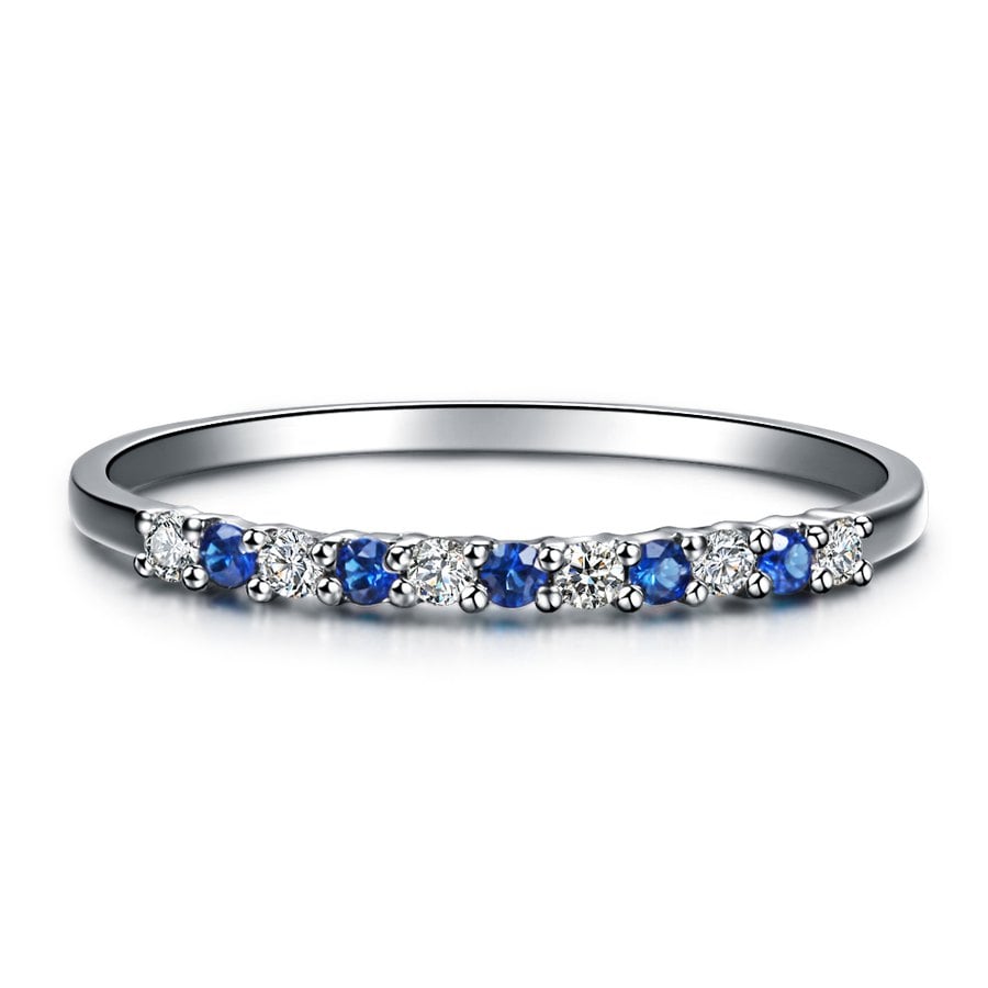 Anello Variations magiques Gemperles in oro bianco 18 carati, diamanti e zaffiri blu alternati